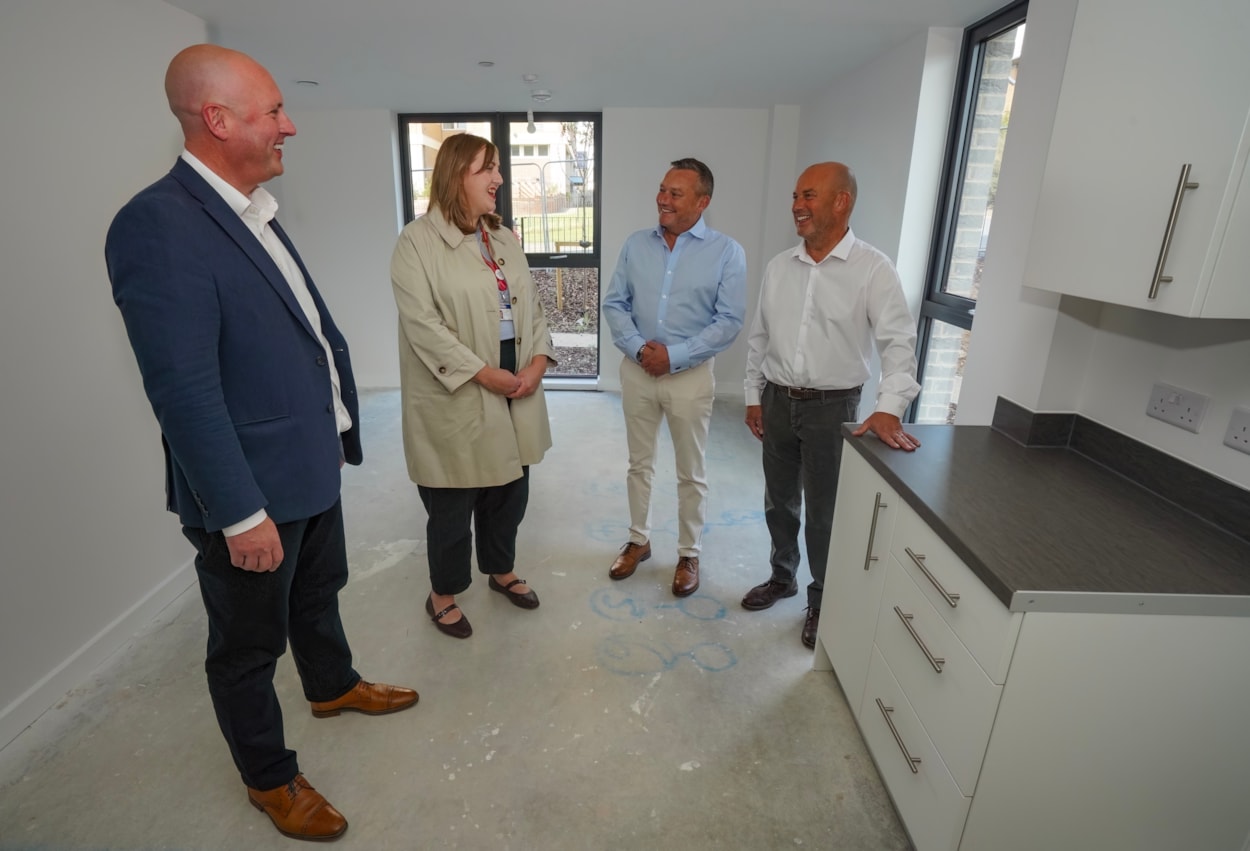 Tour-39: Left to right: David Wingfield (managing director of Construction East at Wates), Councillor Jess Lennox (Leeds City Council’s executive member for housing), Darren Quarmby and Damian Quarmby take a tour of the new housing development.