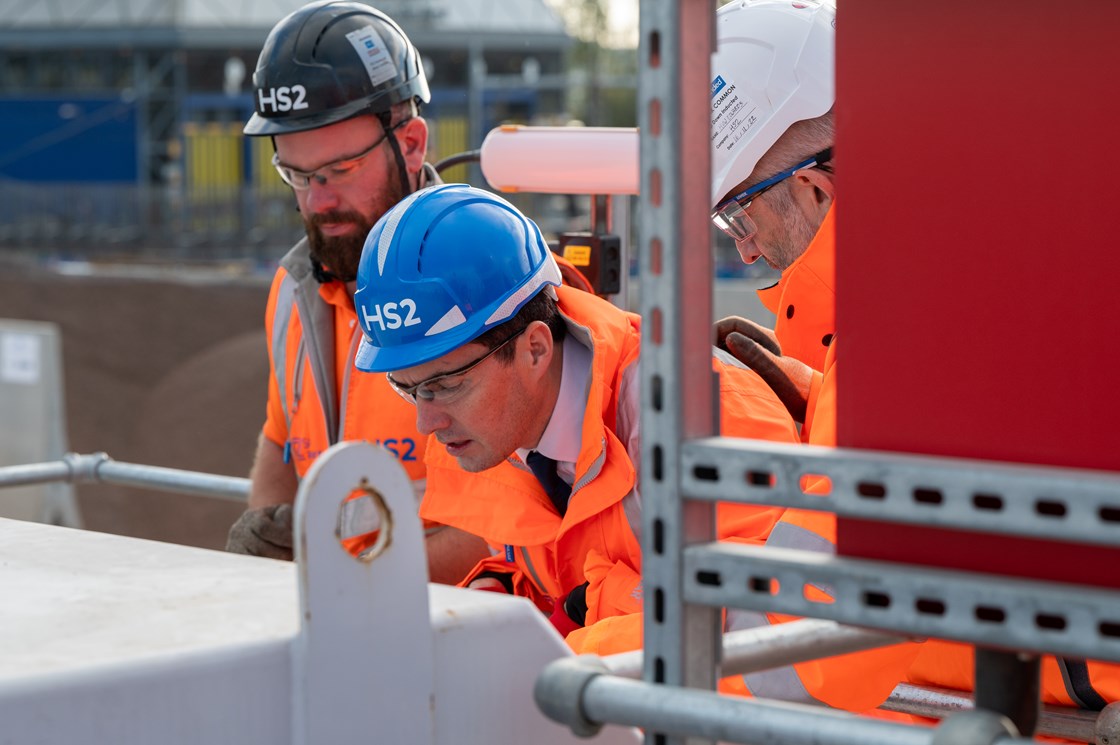 HS2 Minister Huw Merriman officially launches the West London spoil conveyor at HS2's Old Oak Common site-2: L-R: Laurence Troke, Construction Manager, PX Fairpoint, Huw Merriman MP, Minster for Rail, Huw Edwards, Project Client Director, HS2 Ltd