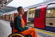 TfL Image - Wheelchair user at Stratford station: TfL Image - Wheelchair user at Stratford station