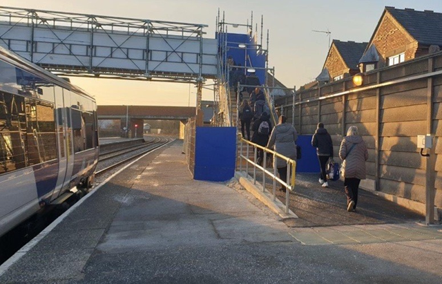 Passengers use the temporary footbridge at Bridlington station: Passengers use the temporary footbridge at Bridlington station