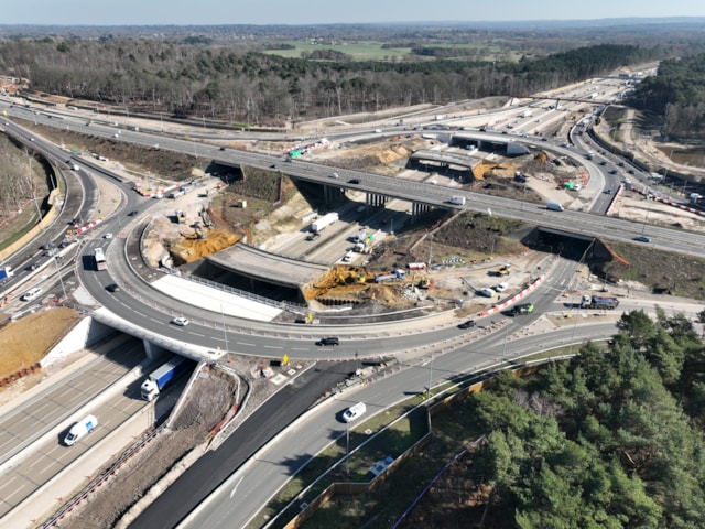 M25 J10 gyratory 2: An aerial view of the new gyratory at M25 J10. The bridge that will be demolished this weekend can be seen in the background, with the bridge that will be demolished in two weeks' time in the foreground.