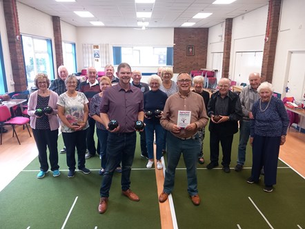 Councillor Matt Rogers, cabinet member for adult social care, and David Harbach, chair of Age Concern Stourbridge, with members of the indoor bowls club during their taster session at the Ageing Well Festival.