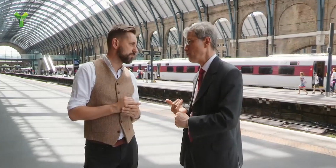Network Rail's Jon Burden (R) discusses the Victorian design features at King's Cross with presenter Tim Dunn (L)