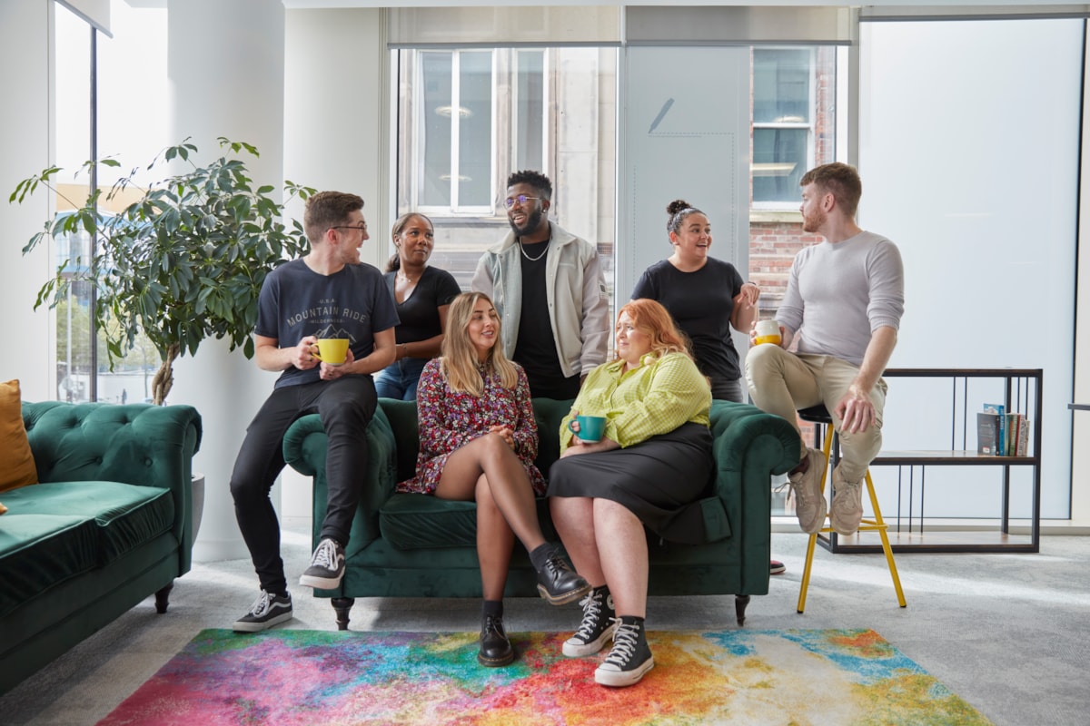 Group of colleagues on sofa