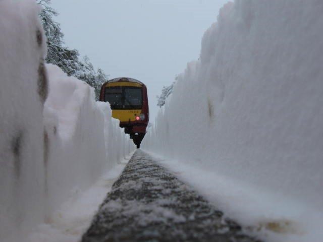 Snow covered railway - rail head: winter weather