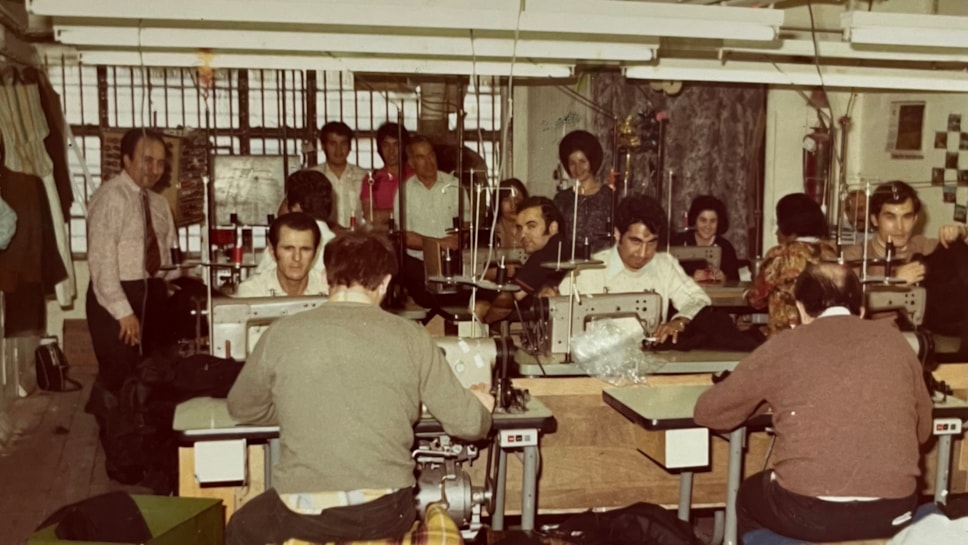 Ibrahim Kozan (centre) working at Ferris Fashion, Aldgate.  Image courtesy of Ibrahim Kozan.