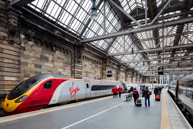 Glasgow Central - Virgin train at platform, with staff