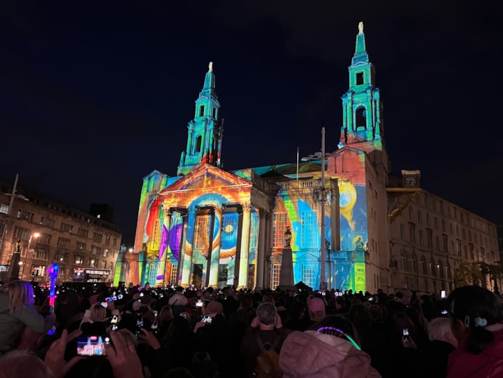 Light Night 2025: At Leeds Civic Hall a remarkable new commission by Portuguese artists Ocubo, co-produced by the British Library, was projected across the building’s façade.
Entitled, Portals: The Machine of Worlds, the piece uses fantastical imagery from books in the library’s collection, exploring universes of science, illusion and discovery.