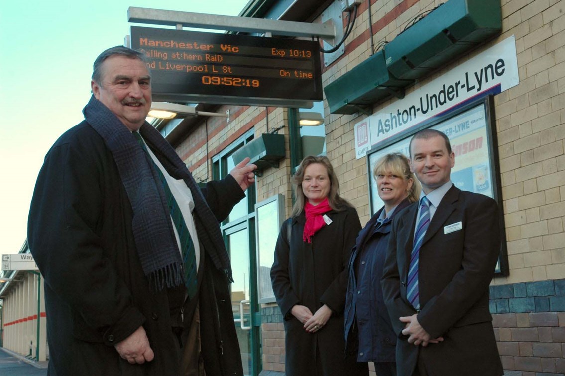 Ashton station information screens: l-r
Cllr Alan Whitehead (Chair, GMPTA Nransport Network Committee); Claire Rawson (Network Rail Customer Services Manager); Ashton station ticket clerk; Graham Large (Northern Station Manager)