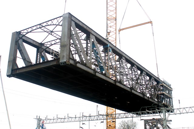 Rugby Birdcage Bridge Removal: The 'birdcage' bridge at Rugby is lifted out by a 1200 tonne crane on Christmas Day 2006.  The bridge, built in 1898 and disused since the 1960’s was in a poor condition and need to be removed before it presented a risk to passengers using the West Coast Main Line underneath