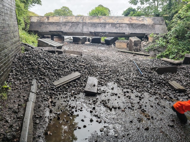 Image shows section of railway bridge on road following collision in Bedworth: Image shows section of railway bridge on road following collision in Bedworth