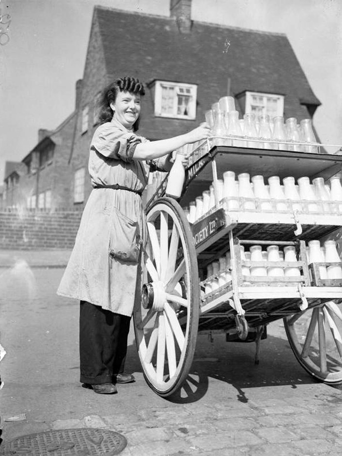 Ada Stone delivering milk, 1942, location unknown