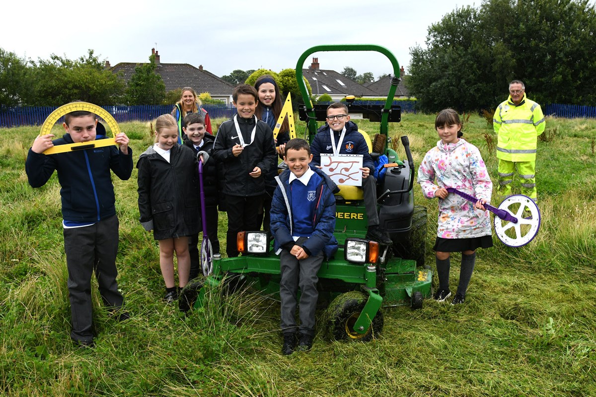 Pupils with Natalie White and George from Outdoor Services