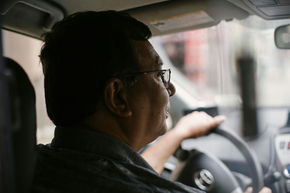 man driving credit pexels tim samuel