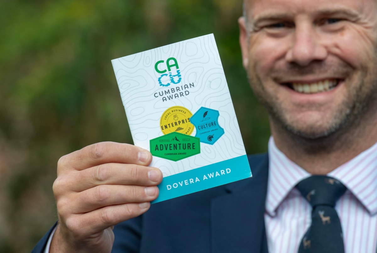 Danny Gee, head of West Cumbria Learning Centre, holding a copy of the Cumbrian Award passport, a scheme for schoolchildren in the county which is being endorsed by University of Cumbria