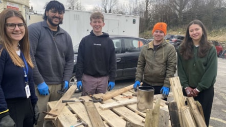 Image shows Year in Industry students creating'Bug Hotels' - 1