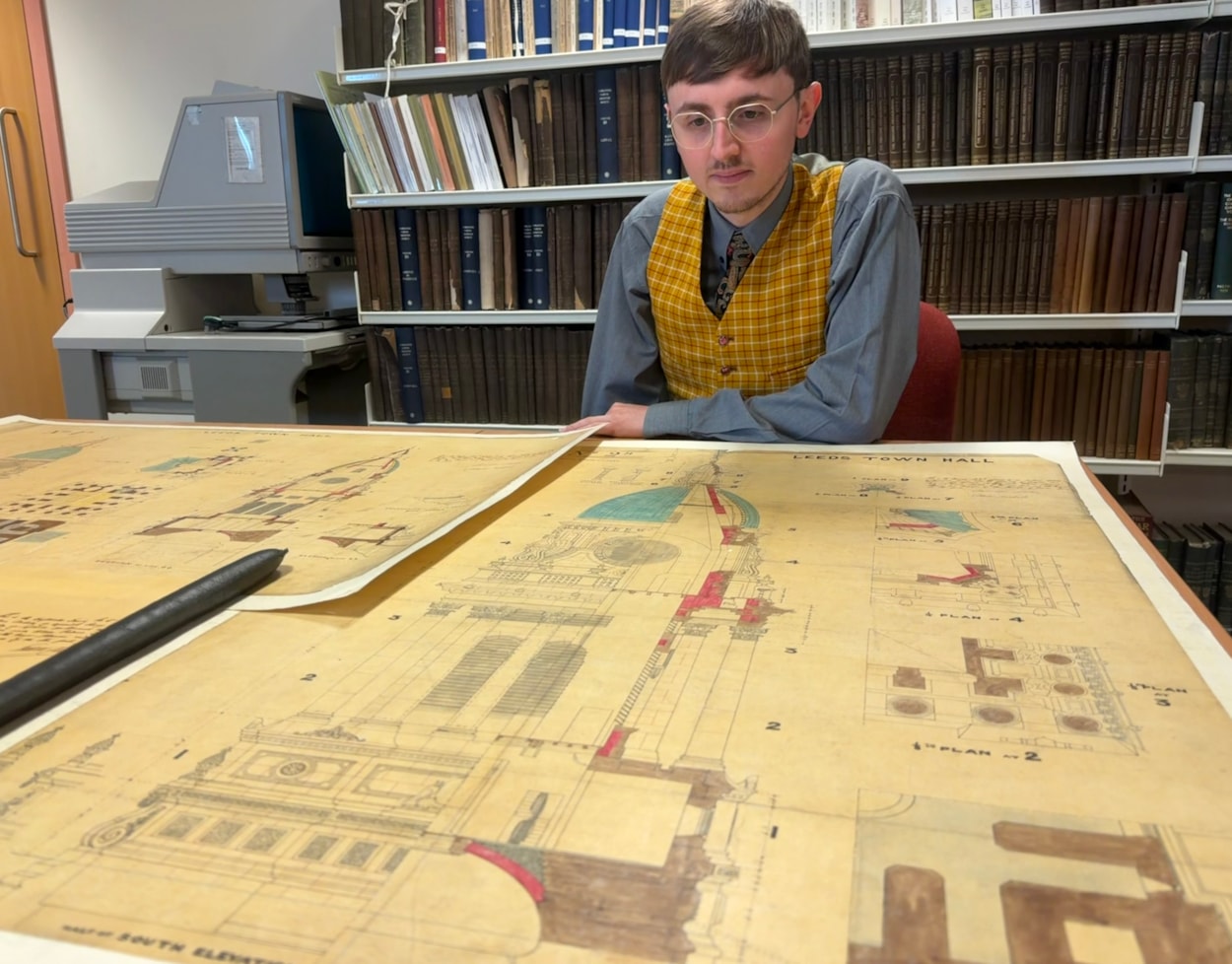 Leeds Town Hall clock tower: Archives assistant Alex Pearson with the plans for the Leeds Town hall clock tower.
Created in 1857, a year before the building was opened by Queen Victoria, the elaborate illustrations are part of the collection at West Yorkshire Archives Service and include the classical stonework and emblematic owls adorning the tower exterior.
They were prepared as part of the “articles agreement” put together by contractors Addy and Nicholls, who took on the mammoth task of constructing the tower.