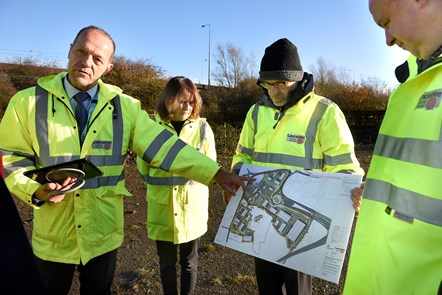 County council officers looking at plans for the site during a visit in November 2023.