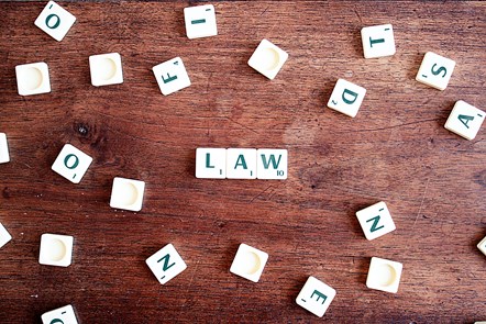 scrabble letters spelling the word law