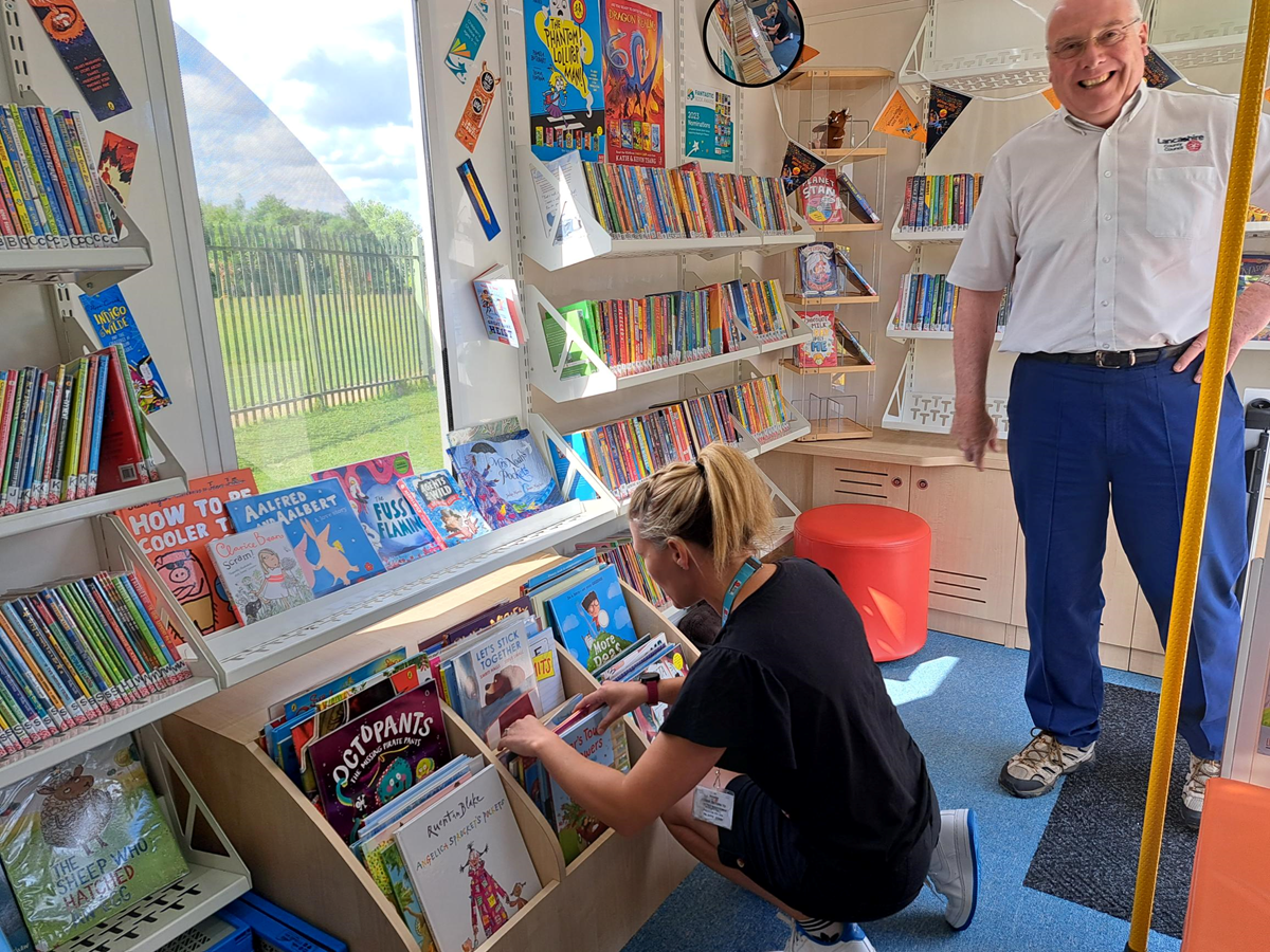 Dawn Child and Tim Margrove, support manager and support officer for Lancashire County Council's cultural services, who have been taking the new school mobile bus out to school across the region since Easter.