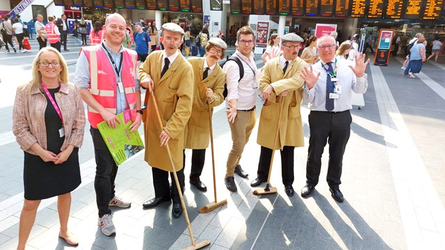 West Midlands rail bosses with Natural Theatre performers at Birmingham New Street station