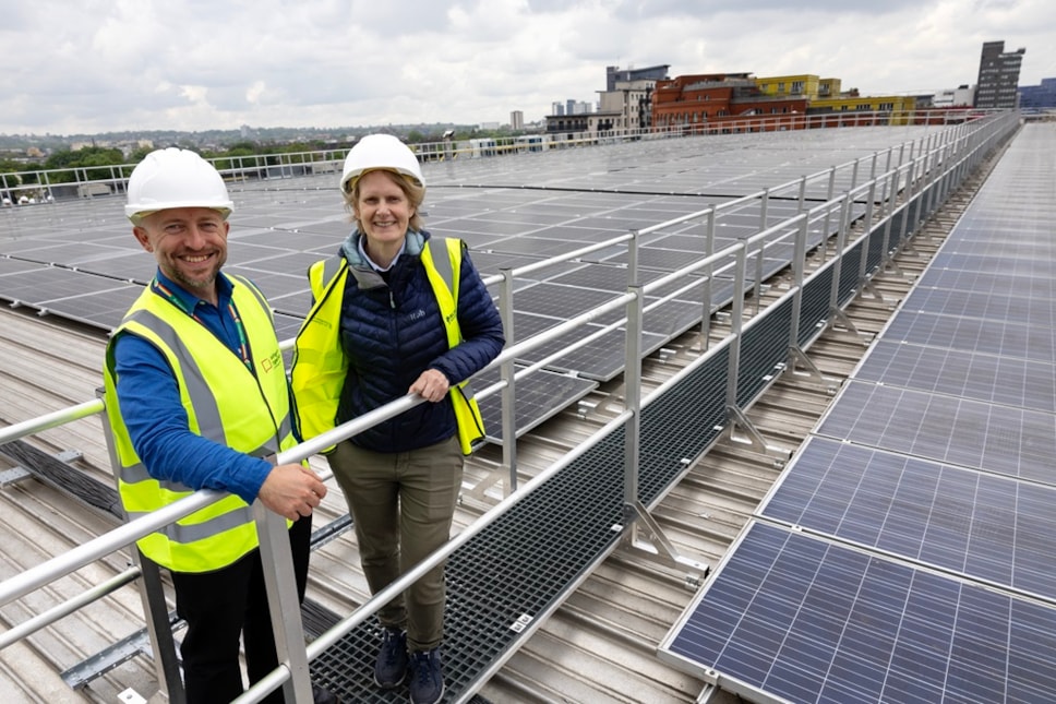 Cllr Rowena Champion (pictured right) and Martijn Cooijmans (pictured left), Islington Council Director of Climate Change and Transport, pose on the roof of the Islington Waste and Recycling Centre