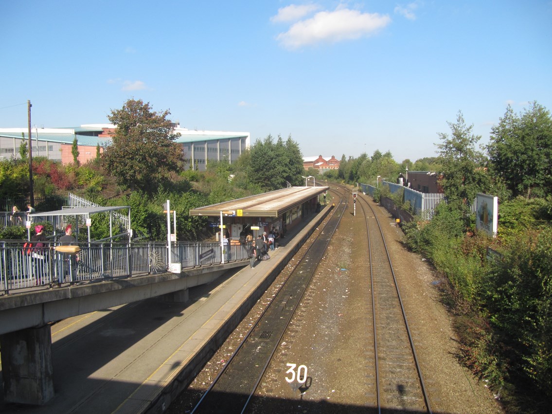 Salford Crescent: The ramp onto the platform, which ends at the ticket office window and creates a bottleneck, will be replaced by a new lift, staricase and footbridge leading to a new ticket office at road level.