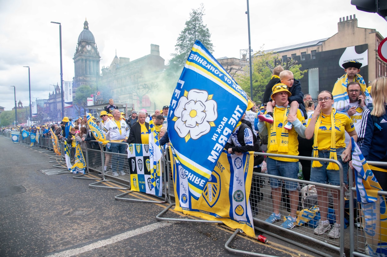 parade 5: Fans waiting on The Headrow to greet Leeds United's players at the club's promotion parade.