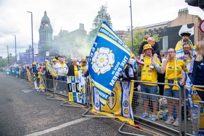 parade 5: Fans waiting on The Headrow to greet Leeds United's players at the club's promotion parade.