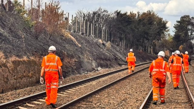 Rail passengers warned of ongoing disruption after major Stourbridge fire: Network Rail teams inspecting fire damage to the railway embankment