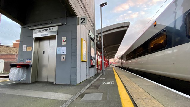 Passengers reminded of major upgrade to lifts at Macclesfield station: Macclesfield station platform 2 and 3 lift with Avanti West Coast train final