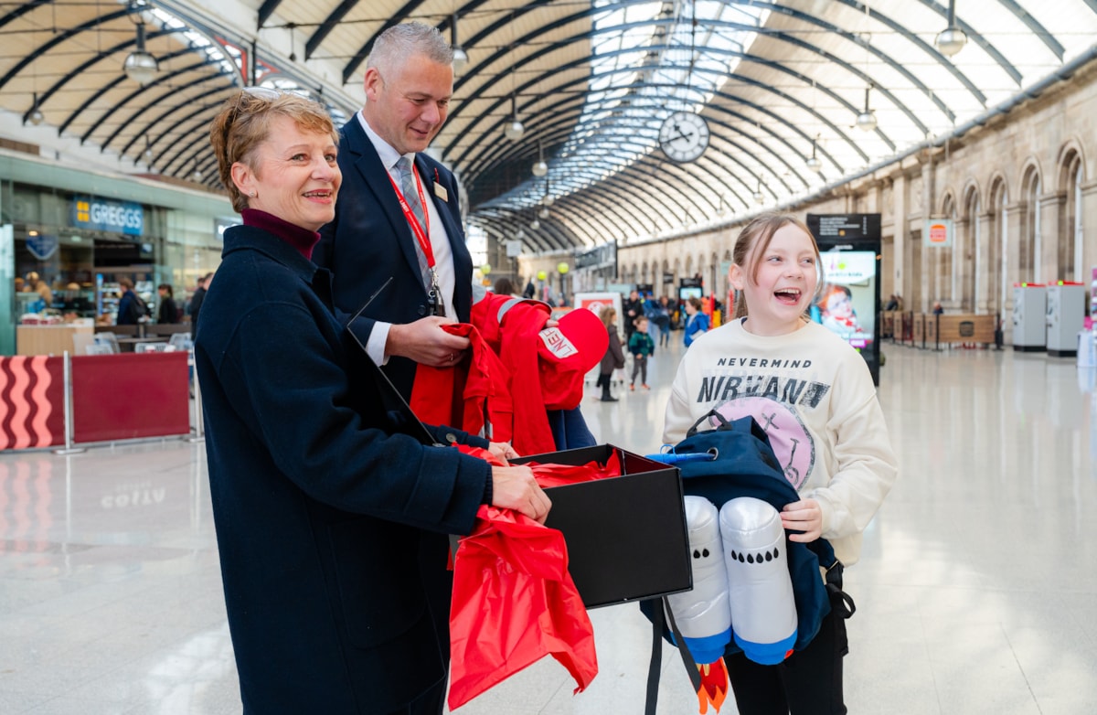 Barbara Tomczak (Dimensions) and Chris Healy (LNER) present Fen's uniform