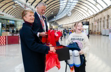 Barbara Tomczak (Dimensions) and Chris Healy (LNER) present Fen's uniform