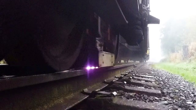 Track side shot of lasers treating railhead October 2022