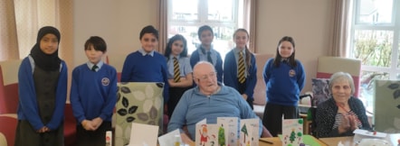 Roy, Pam and the children with some of the cards