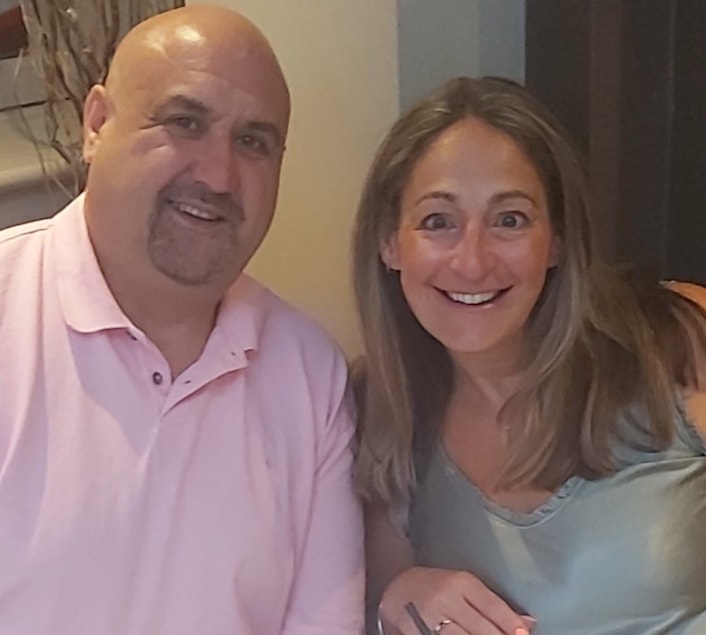Michelle Raw and husband Mark: Image shows a couple, Michelle and Mark, pictured side by side, smiling at the camera