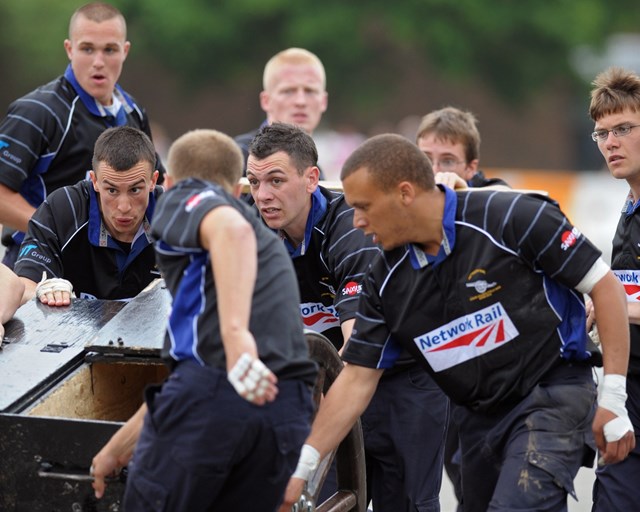 Apprentices taking part in field gun competition