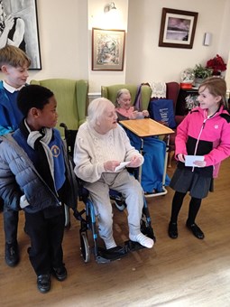 Audrey receiving Cards for Kindness from pupils at Upperby Primary  School