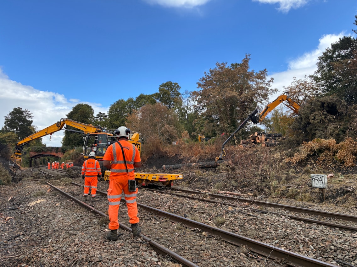 Network Rail engineers clearing fire-damaged vegetation from the railway in Stourbridge