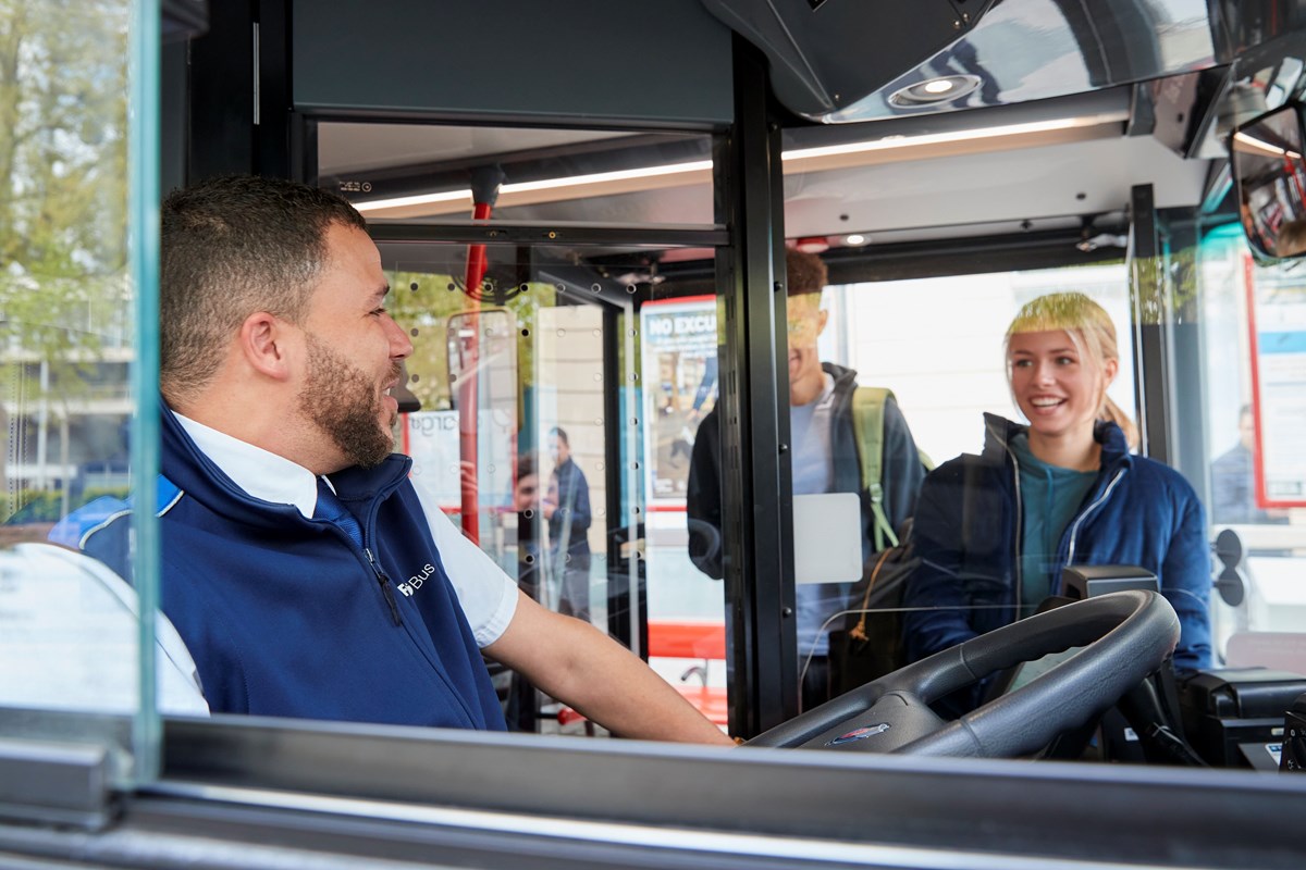 First driver speaking to passengers