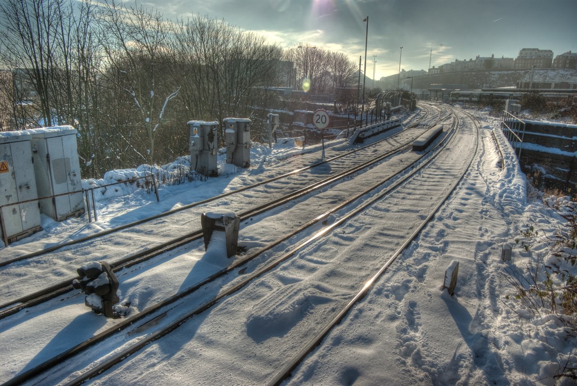 Snow covered railway tracks: winter weather
