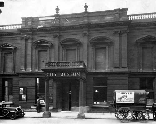 Leeds City Museum Credit West Yorkshire Archives: Leeds City Museum: Undated. Image shows the City Museum, designed by Robert Chantrell and which opened on 6th April 1821 at a cost of £6150. The building included a lecture room, Museum, Library and Laboratory. Enlarged in 1861-62, the entrance was moved from Bond Street to Park Row visible here. On the March 14, 1941 an air raid seriously damaged the hall with the Park Row frontage and many exhibits completely destroyed. The Museum was closed in 1965 and demolished in the summer of 1966. Credit West Yorkshire Archives.