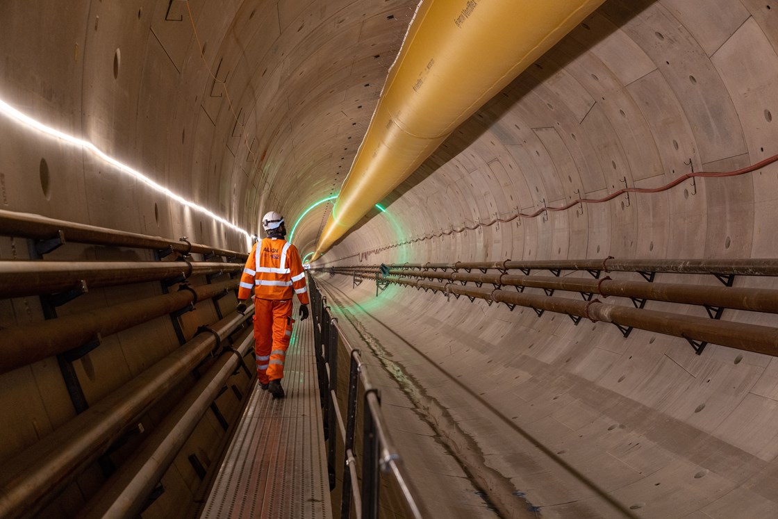 Image of a construction worker walking inside the Chiltern tunnel