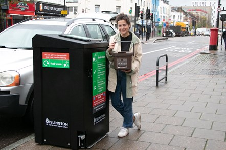 One of the food waste bins on Holloway Road being used by a resident