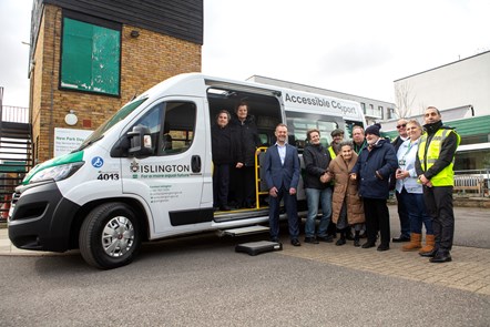 Residents who use the council's Highbury New Park Day Centre, Accessible Community Transport staff, Cllr Champion and Keith Townsend pose by an electric minibus