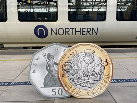 Image shows £1 coin and 50p piece alongside a Northern train-2
