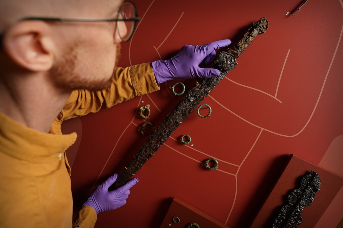 Dr Matthew Knight puts the finishing touches to the Marshill warrior display. Photo © Stewart Attwood  (5)