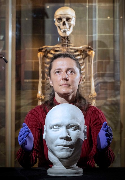 Curator Dr Tacye Phillipson with the skeleton and death mask of William Burke, on loan from the Anatomical Museum collection, University of Edinburgh. Photo © Neil Hanna-2