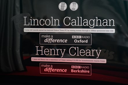 BBC Make A Difference Superstars Henry Cleary, eight, and Lincoln Callaghan, six, have become the youngest to have their names on the side of a train
