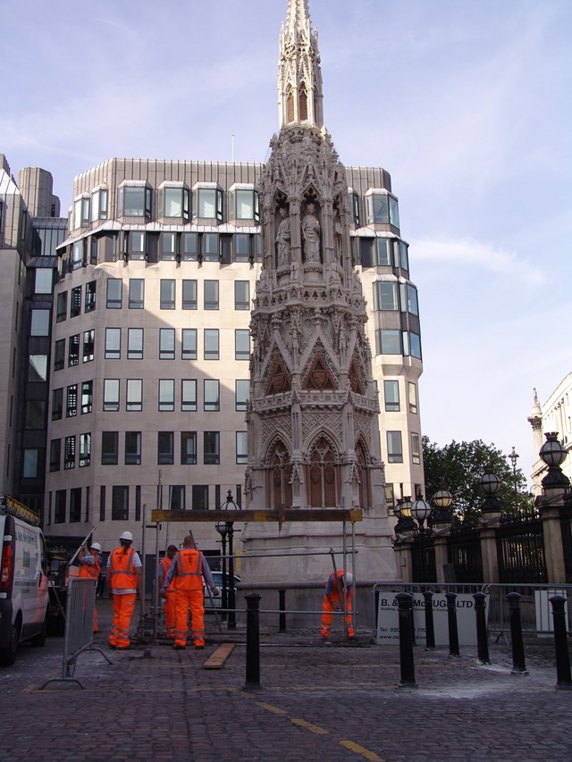 Eleanor Cross Completion_1: The final pieces of scaffolding around the Eleanor Cross are removed